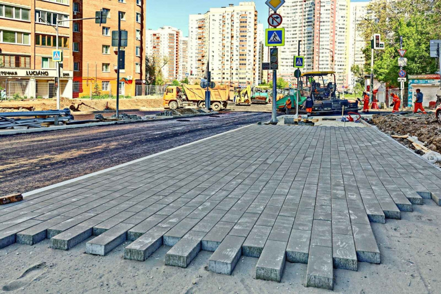 На нижнем участке реконструкции улицы XXII Партсъезда рачалась укладка финишного слоя  асфальтобетона